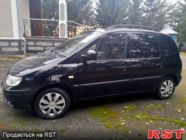 Черный Хендай Матрикс, объемом двигателя 1.8 л и пробегом 154 тыс. км за 5100 $, фото 2 на Automoto.ua