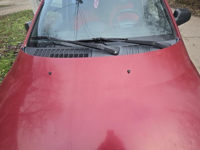 Красный Хендай Матрикс, объемом двигателя 1.6 л и пробегом 336 тыс. км за 3500 $, фото 1 на Automoto.ua