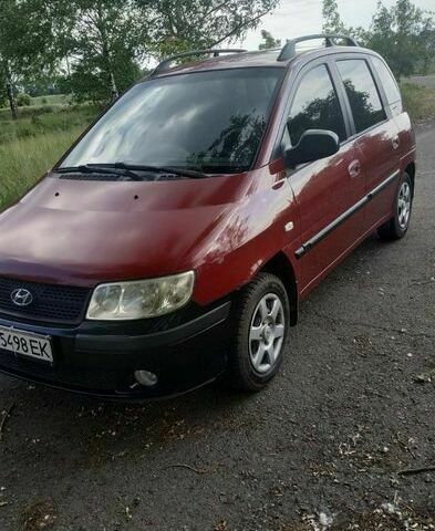 Красный Хендай Матрикс, объемом двигателя 1.5 л и пробегом 220 тыс. км за 3700 $, фото 1 на Automoto.ua