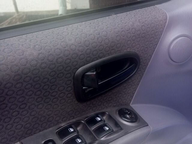 Серый Хендай Матрикс, объемом двигателя 1.6 л и пробегом 275 тыс. км за 4499 $, фото 4 на Automoto.ua