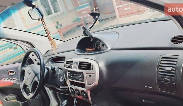 Серый Хендай Матрикс, объемом двигателя 1.6 л и пробегом 225 тыс. км за 4900 $, фото 14 на Automoto.ua