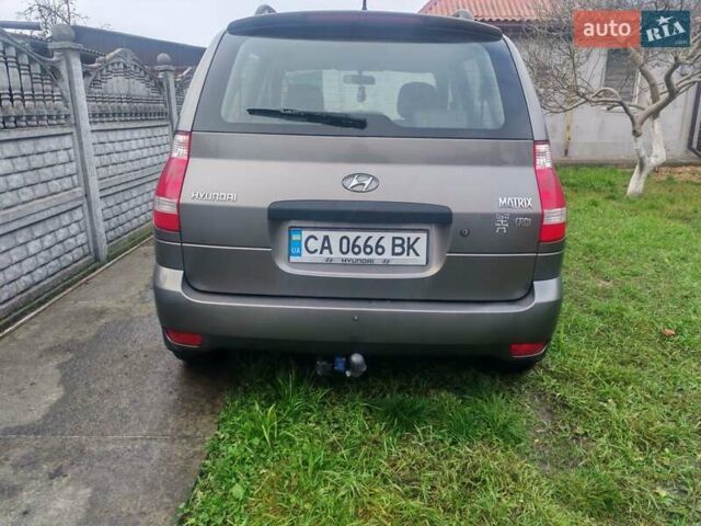 Серый Хендай Матрикс, объемом двигателя 1.49 л и пробегом 188 тыс. км за 5300 $, фото 4 на Automoto.ua