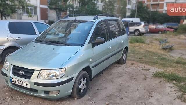 Синий Хендай Матрикс, объемом двигателя 1.49 л и пробегом 302 тыс. км за 3100 $, фото 2 на Automoto.ua