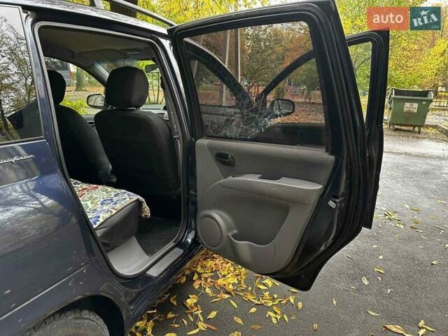 Синий Хендай Матрикс, объемом двигателя 1.6 л и пробегом 113 тыс. км за 4800 $, фото 11 на Automoto.ua