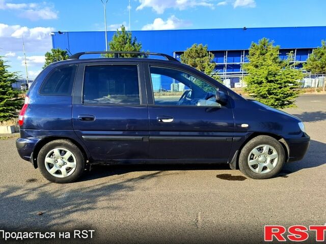 Синий Хендай Матрикс, объемом двигателя 1.6 л и пробегом 245 тыс. км за 3500 $, фото 1 на Automoto.ua