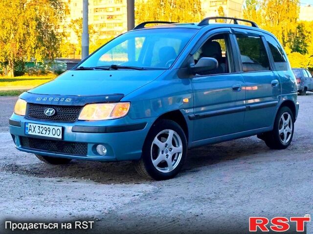 Синий Хендай Матрикс, объемом двигателя 1.6 л и пробегом 255 тыс. км за 4400 $, фото 7 на Automoto.ua