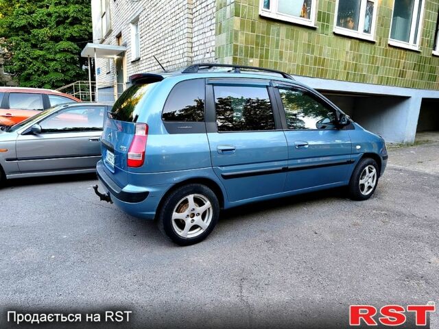 Синий Хендай Матрикс, объемом двигателя 1.6 л и пробегом 255 тыс. км за 4400 $, фото 1 на Automoto.ua