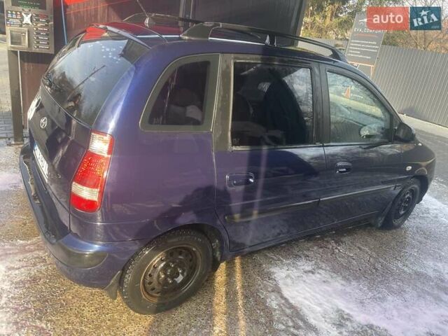 Синий Хендай Матрикс, объемом двигателя 1.49 л и пробегом 235 тыс. км за 4000 $, фото 2 на Automoto.ua