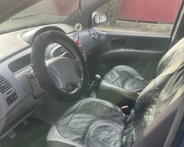 Синий Хендай Матрикс, объемом двигателя 1.49 л и пробегом 235 тыс. км за 4000 $, фото 8 на Automoto.ua