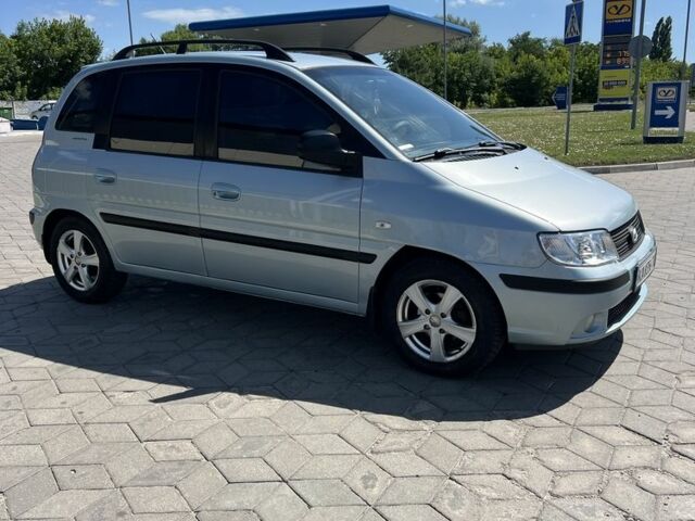 Синий Хендай Матрикс, объемом двигателя 1.8 л и пробегом 243 тыс. км за 4000 $, фото 5 на Automoto.ua