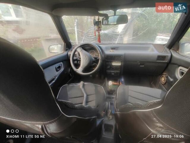 Черный Хендай Пони, объемом двигателя 1.5 л и пробегом 290 тыс. км за 270 $, фото 4 на Automoto.ua