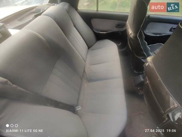 Черный Хендай Пони, объемом двигателя 1.5 л и пробегом 290 тыс. км за 270 $, фото 5 на Automoto.ua