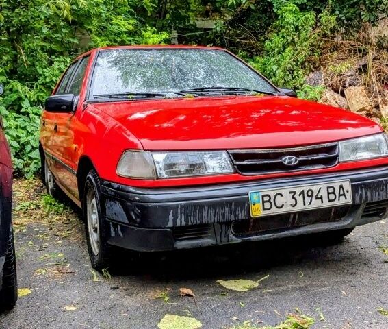 Красный Хендай Пони, объемом двигателя 1.3 л и пробегом 339 тыс. км за 700 $, фото 1 на Automoto.ua