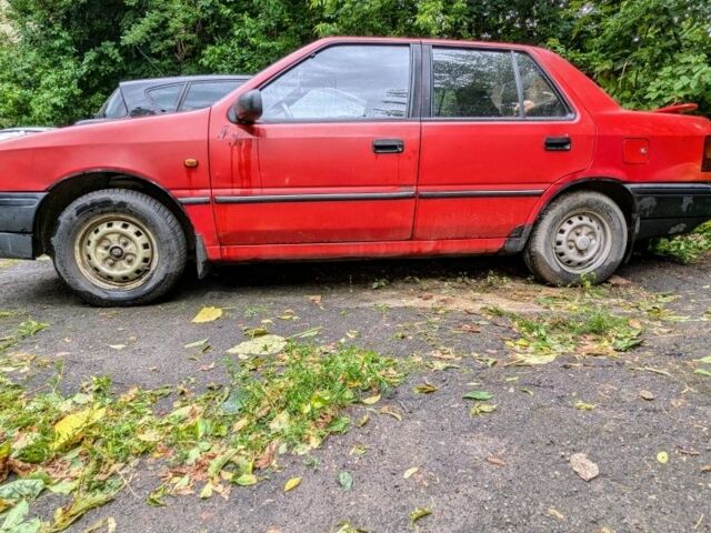 Красный Хендай Пони, объемом двигателя 1.3 л и пробегом 339 тыс. км за 700 $, фото 3 на Automoto.ua