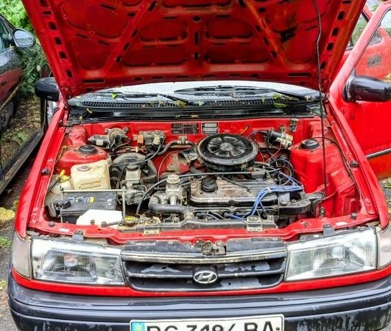 Красный Хендай Пони, объемом двигателя 1.3 л и пробегом 339 тыс. км за 700 $, фото 6 на Automoto.ua