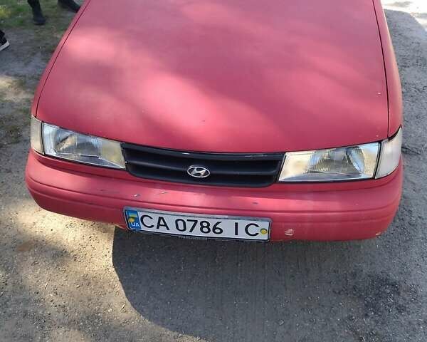 Красный Хендай Пони, объемом двигателя 1.5 л и пробегом 393 тыс. км за 1400 $, фото 2 на Automoto.ua