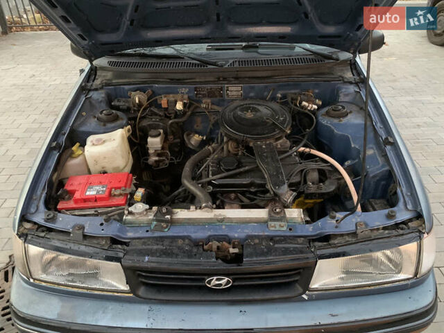 Синий Хендай Пони, объемом двигателя 1.47 л и пробегом 300 тыс. км за 1000 $, фото 5 на Automoto.ua