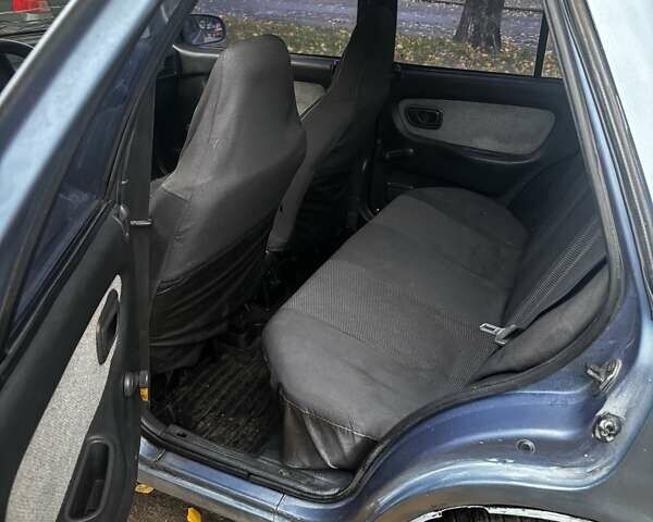 Синій Хендай Поні, об'ємом двигуна 1.5 л та пробігом 316 тис. км за 1300 $, фото 12 на Automoto.ua