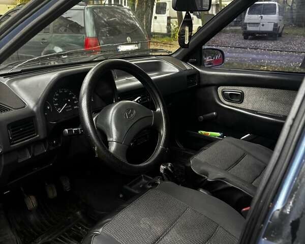 Синій Хендай Поні, об'ємом двигуна 1.5 л та пробігом 316 тис. км за 1300 $, фото 9 на Automoto.ua