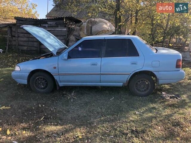 Синий Хендай Пони, объемом двигателя 1.5 л и пробегом 315 тыс. км за 1100 $, фото 1 на Automoto.ua