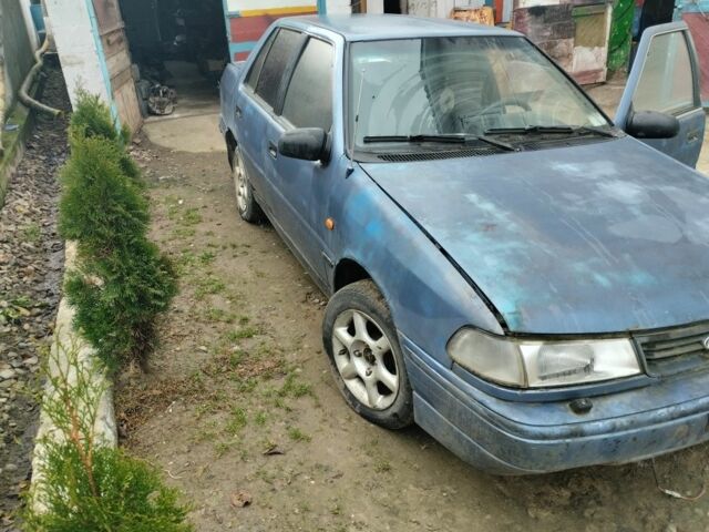 Синий Хендай Пони, объемом двигателя 1 л и пробегом 228 тыс. км за 600 $, фото 5 на Automoto.ua