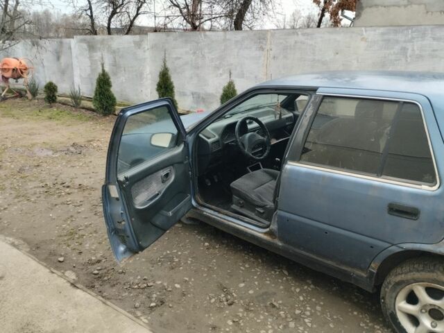 Синий Хендай Пони, объемом двигателя 1 л и пробегом 228 тыс. км за 600 $, фото 2 на Automoto.ua