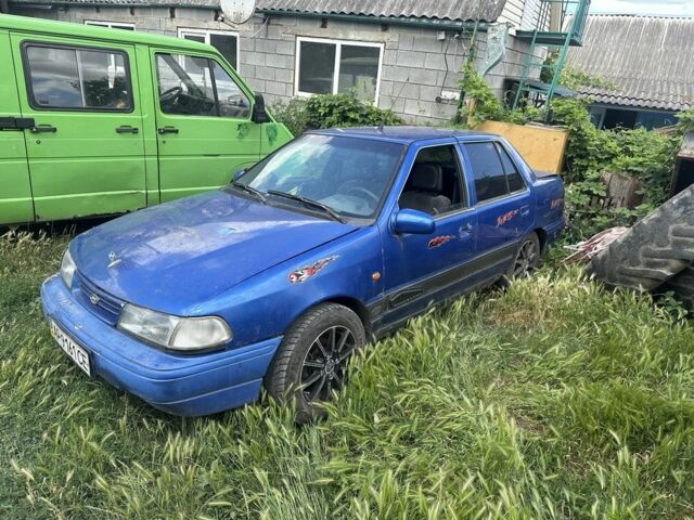 Синий Хендай Пони, объемом двигателя 1.6 л и пробегом 180 тыс. км за 14000 $, фото 1 на Automoto.ua