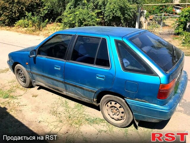 Зелений Хендай Поні, об'ємом двигуна 1.5 л та пробігом 250 тис. км за 840 $, фото 5 на Automoto.ua