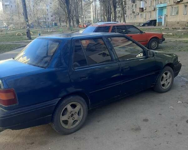 Зеленый Хендай Пони, объемом двигателя 1.6 л и пробегом 567 тыс. км за 1200 $, фото 1 на Automoto.ua