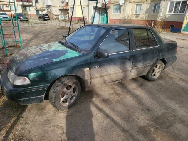 Зеленый Хендай Пони, объемом двигателя 1.5 л и пробегом 42 тыс. км за 1800 $, фото 2 на Automoto.ua