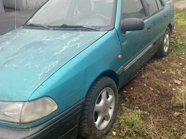Зеленый Хендай Пони, объемом двигателя 1.5 л и пробегом 230 тыс. км за 1100 $, фото 1 на Automoto.ua