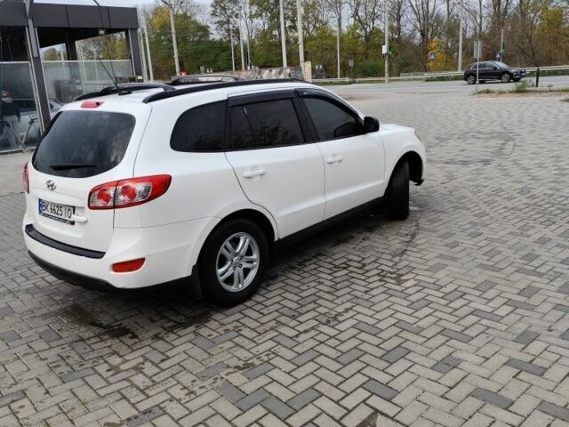 Белый Хендай Санта Фе, объемом двигателя 2.4 л и пробегом 200 тыс. км за 8300 $, фото 2 на Automoto.ua