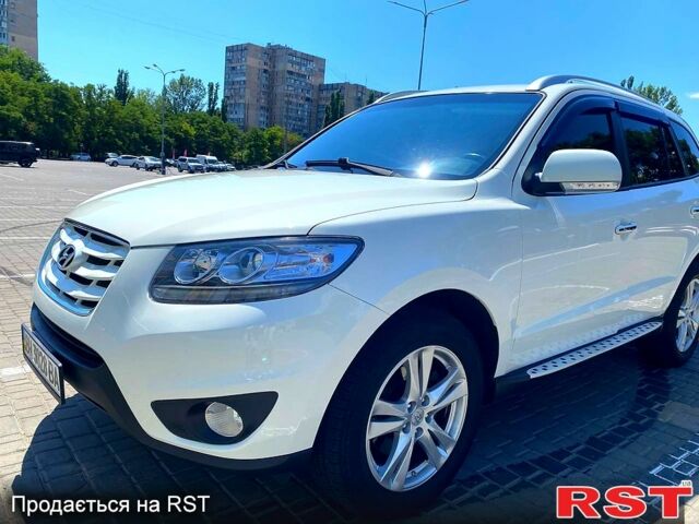 Белый Хендай Санта Фе, объемом двигателя 2.4 л и пробегом 111 тыс. км за 14000 $, фото 1 на Automoto.ua