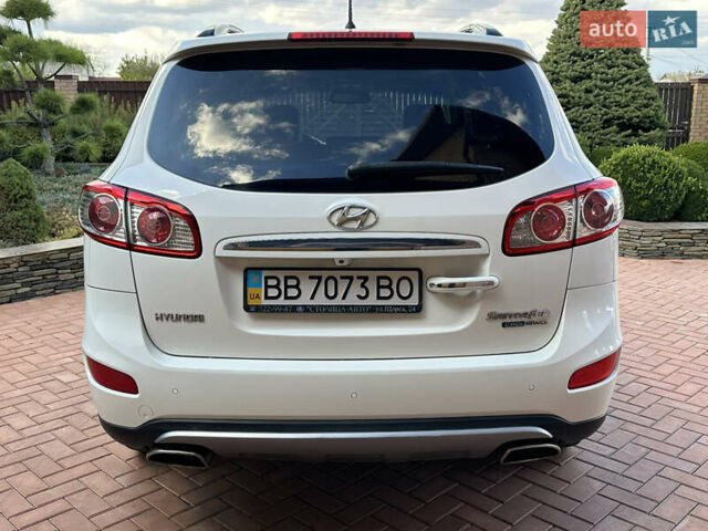 Хендай Санта Фе 2011 у Умани на Automoto.ua Білий Хендай Санта Фе, об'ємом двигуна 2.2 л та пробігом 147 тис. км за 14000 $, фото 13 на Automoto.ua