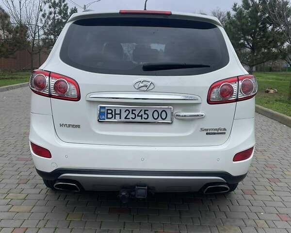 Белый Хендай Санта Фе, объемом двигателя 2.36 л и пробегом 149 тыс. км за 12850 $, фото 1 на Automoto.ua