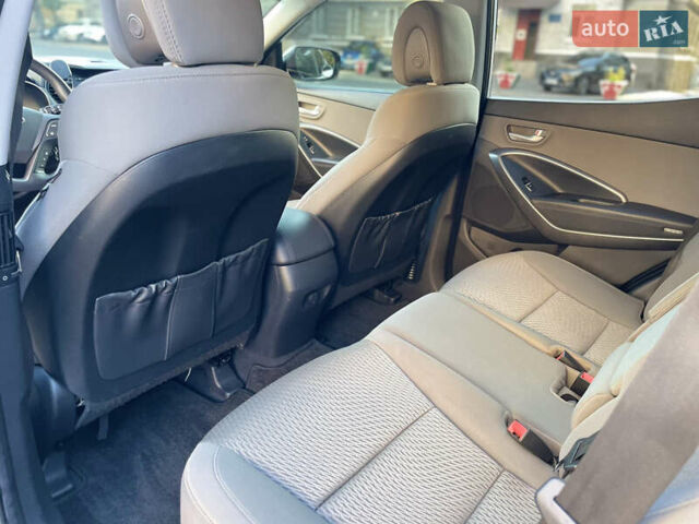 Белый Хендай Санта Фе, объемом двигателя 2.36 л и пробегом 141 тыс. км за 12350 $, фото 9 на Automoto.ua