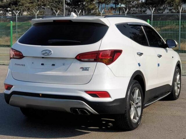 Хендай Санта Фе 2015 у Києві на Automoto.ua Білий Хендай Санта Фе, об'ємом двигуна 2.2 л та пробігом 41 тис. км за 17506 $, фото 6 на Automoto.ua