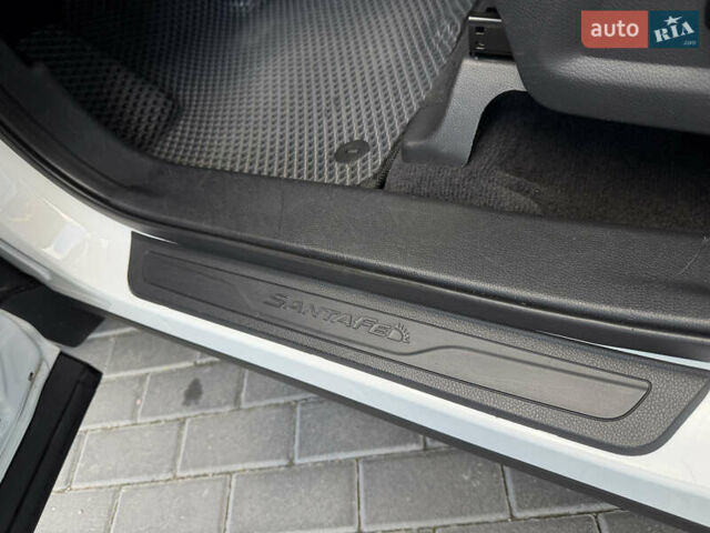 Білий Хендай Санта Фе, об'ємом двигуна 2.36 л та пробігом 177 тис. км за 13300 $, фото 69 на Automoto.ua