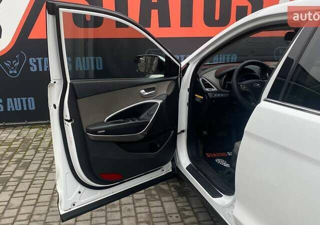 Белый Хендай Санта Фе, объемом двигателя 2.36 л и пробегом 152 тыс. км за 12500 $, фото 12 на Automoto.ua