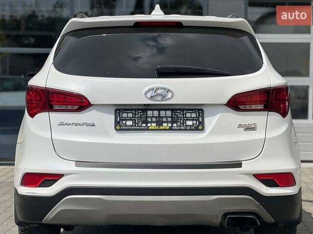 Белый Хендай Санта Фе, объемом двигателя 2.36 л и пробегом 165 тыс. км за 15500 $, фото 4 на Automoto.ua