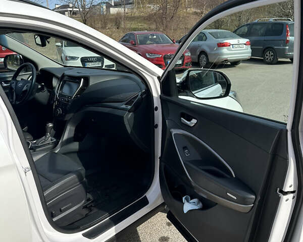 Белый Хендай Санта Фе, объемом двигателя 2 л и пробегом 170 тыс. км за 19000 $, фото 4 на Automoto.ua