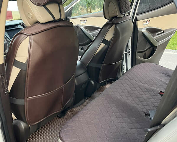 Белый Хендай Санта Фе, объемом двигателя 2.36 л и пробегом 111 тыс. км за 15000 $, фото 13 на Automoto.ua