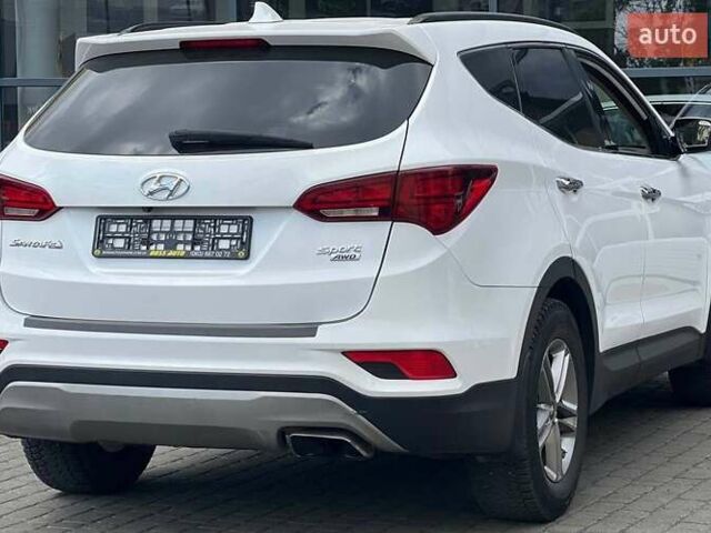 Белый Хендай Санта Фе, объемом двигателя 2.36 л и пробегом 165 тыс. км за 15500 $, фото 5 на Automoto.ua