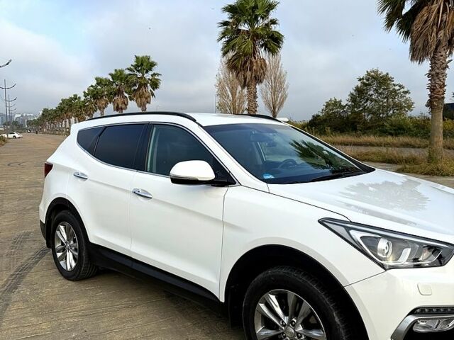 Белый Хендай Санта Фе, объемом двигателя 2.4 л и пробегом 110 тыс. км за 18500 $, фото 1 на Automoto.ua