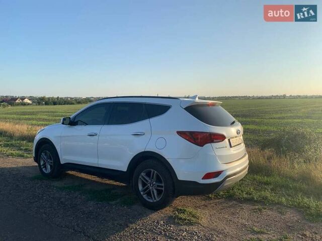 Белый Хендай Санта Фе, объемом двигателя 2.4 л и пробегом 78 тыс. км за 17500 $, фото 1 на Automoto.ua