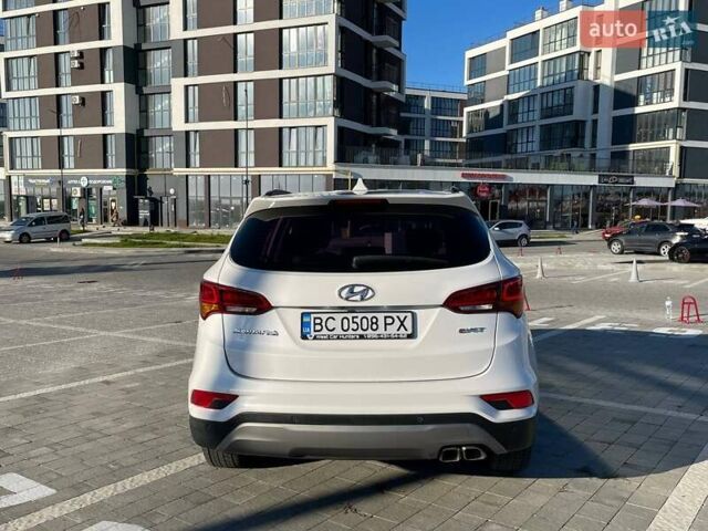 Белый Хендай Санта Фе, объемом двигателя 2 л и пробегом 137 тыс. км за 23500 $, фото 4 на Automoto.ua