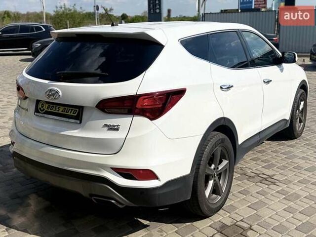 Белый Хендай Санта Фе, объемом двигателя 2.36 л и пробегом 65 тыс. км за 17500 $, фото 6 на Automoto.ua