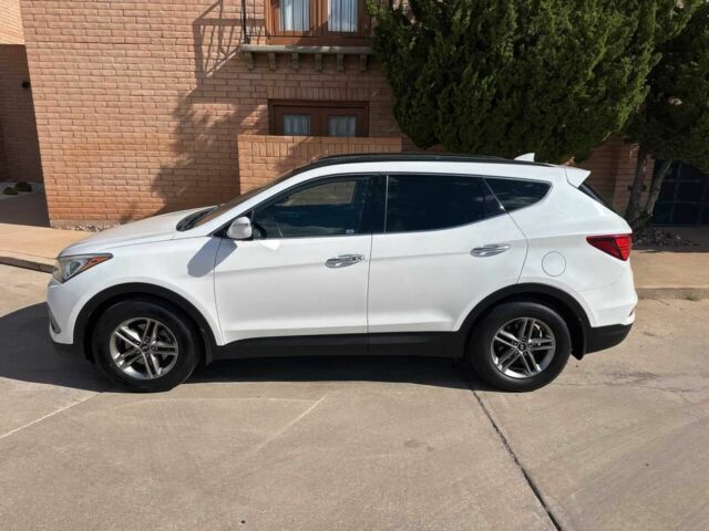 Белый Хендай Санта Фе, объемом двигателя 2.4 л и пробегом 63 тыс. км за 8000 $, фото 2 на Automoto.ua