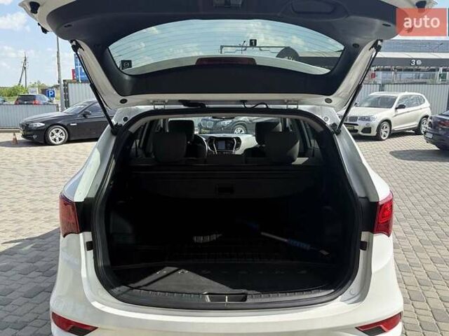 Белый Хендай Санта Фе, объемом двигателя 2.36 л и пробегом 65 тыс. км за 17500 $, фото 23 на Automoto.ua