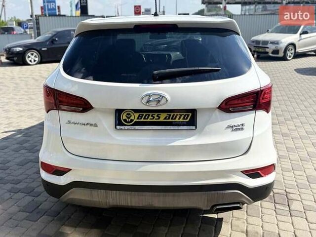Белый Хендай Санта Фе, объемом двигателя 2.36 л и пробегом 65 тыс. км за 17500 $, фото 5 на Automoto.ua